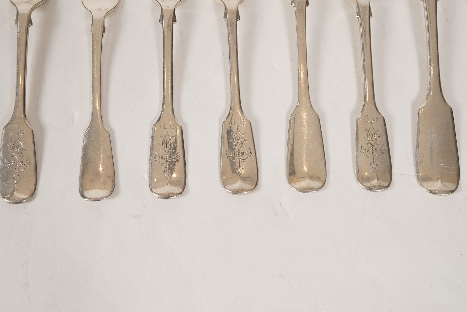 A set of twelve early Victorian provincial silver fiddle pattern table forks and six dessert forks by William Rawlings Sobey, Exeter, 1838, engraved 'Susanna Kingdon'